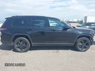 2023 Jeep Grand Cherokee Altitude with VIN 1C4RJJAG4P8817795, listed as a IAAI auction lot 42572709 with 49,468 mi miles and . Bid and sale history available at DreamBid. Image 14.