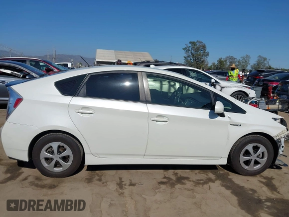 2015 Toyota Prius Four with VIN JTDKN3DU4F1977363, listed as a IAAI auction lot 42283570 with 185,992 mi miles and . Bid and sale history available at DreamBid. Image 13.
