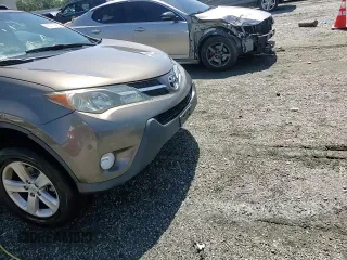 2013 Toyota RAV4 XLE with VIN 2T3RFREV6DW125021, listed as a Copart auction lot 58011425 with 167,139 mi miles and Salvage title. Bid and sale history available at DreamBid. Image 13.
