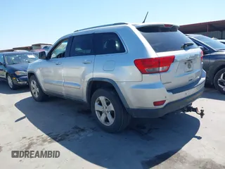 2012 Jeep Grand Cherokee Laredo with VIN 1C4RJEAG5CC112230, listed as a IAAI auction lot 41997483 with 302,923 mi miles. Bid and sale history available at carsss.com. Image 14.