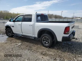 2017 Ram 1500 Rebel z VIN 1C6RR6YT2HS693644, wystawiony jako Copart lot #52570215 z przebiegiem 127 023 mil mil oraz Nie do naprawy • Non repairable. Historia ofert i sprzedaży dostępna na DreamBid. Obrazek 2.