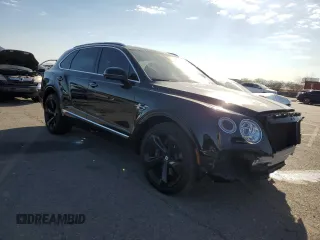 2019 Bentley Bentayga V8 z VIN SJAAM2ZV5KC024154, wystawiony jako Copart lot #74990344 z przebiegiem 41 589 mil mil oraz Szkoda całkowita • Salvage title. Historia ofert i sprzedaży dostępna na DreamBid. Obrazek 4.