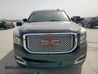 2015 GMC Yukon Denali with VIN 1GKS2CKJ2FR580533, listed as a Copart auction lot 48455205 with 147,532 mi miles and Salvage Title. Bid and sale history available at carsss.com. Image 5.