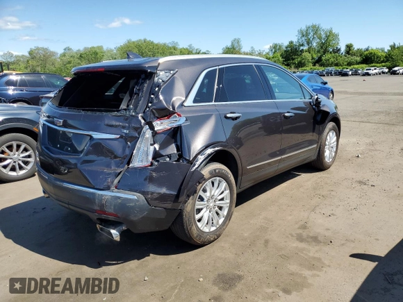 2018 Cadillac XT5 AWD with VIN 1GYKNBRS8JZ203963, listed as a Copart auction lot 57243165 with 18,407 mi miles and Salvage title. Bid and sale history available at DreamBid. Image 3.