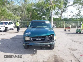 1997 Isuzu Hombre S z VIN 1GGCS1445V8656678, wystawiony jako IAAI lot #41953915 z przebiegiem 114 797 mil mil oraz . Historia ofert i sprzedaży dostępna na DreamBid. Obrazek 12.