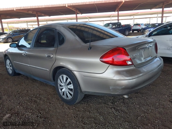 2002 Ford Taurus LX with VIN 1FAFP52U72G284116, listed as a IAAI auction lot 42004075 with 86,544 mi miles. Bid and sale history available at carsss.com. Image 3.