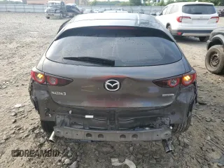 2019 Mazda 3 with VIN JM1BPAJMXK1119912, listed as a Copart auction lot 59708825 with 50,459 mi miles and Salvage title. Bid and sale history available at DreamBid. Image 6.