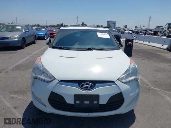 2013 Hyundai Veloster w/Black Int with VIN KMHTC6AD8DU174885, listed as a IAAI auction lot 42408175 with 132,366 mi miles and . Bid and sale history available at DreamBid. Image 6.