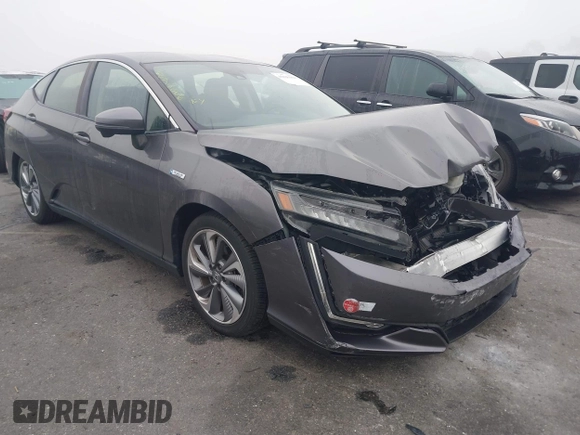 2018 Honda Clarity z VIN JHMZC5F15JC009223, wystawiony jako IAAI lot #41626369 z przebiegiem 46 014 mil mil oraz . Historia ofert i sprzedaży dostępna na DreamBid. Obrazek 1.