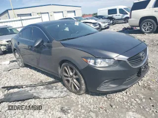 2016 Mazda Mazda6 i Touring with VIN JM1GJ1V51G1402829, listed as a Copart auction lot 74257984 with 134,648 mi miles and Salvage Title. Bid and sale history available at carsss.com. Image 4.