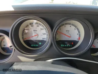 2009 Dodge Challenger SE with VIN 2B3LJ44V49H542199, listed as a Copart auction lot 50326325 with 124,536 mi miles and Salvage Title. Bid and sale history available at carsss.com. Image 9.