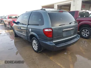 2001 Chrysler Town & Country with VIN 2C4GP54371R356559, listed as a IAAI auction lot 41731368 with 195,903 mi miles and . Bid and sale history available at DreamBid. Image 3.