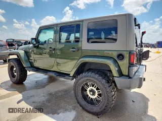 2008 Jeep Wrangler Unlimited Sahara with VIN 1J4GA59148L608970, listed as a Copart auction lot 64433495 with 134,055 mi miles and Salvage title. Bid and sale history available at DreamBid. Image 2.