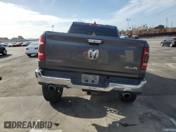 2020 Ram 1500 Laramie with VIN 1C6SRFDT1LN263036, listed as a Copart auction lot 48560655 with 130,923 mi miles and Salvage Title. Bid and sale history available at carsss.com. Image 6.