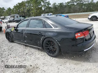 2014 Audi A8 3.0T z VIN WAURGAFD2EN002567, wystawiony jako Copart lot #48188395 z przebiegiem 159 477 mil mil oraz Szkody całkowita. Historia ofert i sprzedaży dostępna na DreamBid. Obrazek 2.