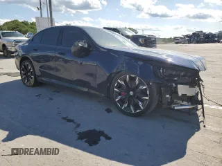2024 BMW i5 M60 with VIN WBY43FK07RCR79924, listed as a Copart auction lot 58249825 with 17,589 mi miles and Salvage title. Bid and sale history available at DreamBid. Image 4.