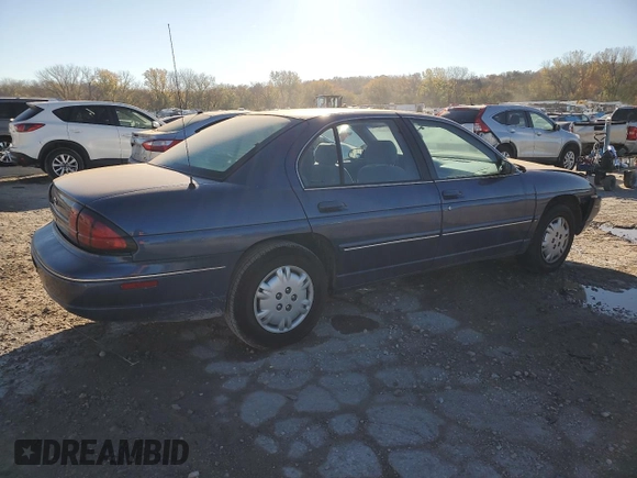 1997 Chevrolet Lumina LS with VIN 2G1WL52M0V1100215, listed as a Copart auction lot 78924694 with 200,402 mi miles and Salvage Title. Bid and sale history available at DreamBid. Image 3.