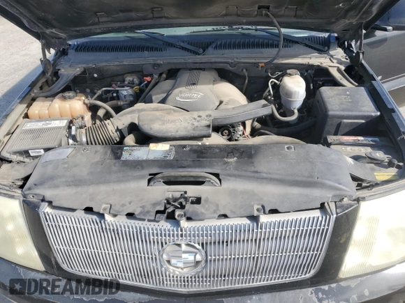 2003 Cadillac Escalade z VIN 1GYEK63N93R143629, wystawiony jako Copart lot #50333955 z przebiegiem 102 828 mil mil oraz Szkoda całkowita • Salvage title. Historia ofert i sprzedaży dostępna na DreamBid. Obrazek 12.