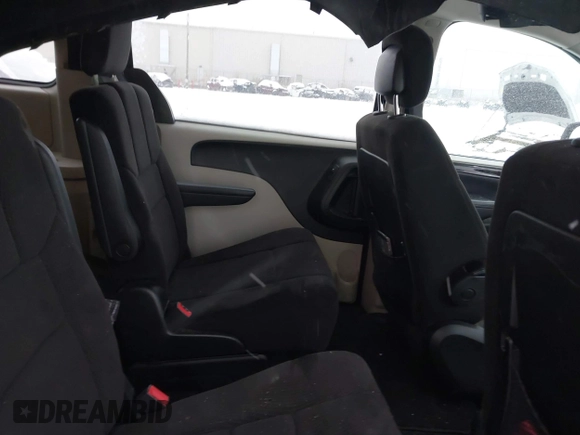 2013 Dodge Grand Caravan SE with VIN 2C4RDGBGXDR746630, listed as a IAAI auction lot 41239381 with 213,421 mi miles and . Bid and sale history available at DreamBid. Image 8.