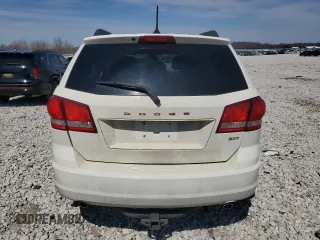 2015 Dodge Journey SXT with VIN 3C4PDDBG5FT544140, listed as a Copart auction lot 52827985 with 153,224 mi miles and Salvage Title. Bid and sale history available at DreamBid. Image 2.