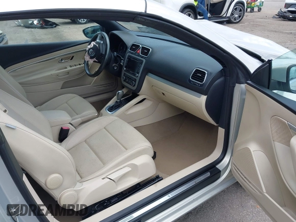 2012 Volkswagen Eos Komfort with VIN WVWBW7AHXCV006075, listed as a IAAI auction lot 42054520 with 104,037 mi miles and . Bid and sale history available at DreamBid. Image 5.