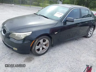 2008 BMW 5 Series 528i with VIN WBANU53578CT00673, listed as a IAAI auction lot 41960389 with 142,409 mi miles and . Bid and sale history available at carsss.com. Image 2.