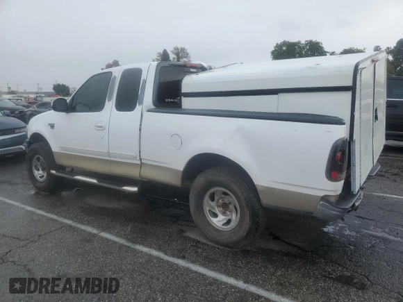 2002 Ford F-150 XL with VIN 1FTRX17LX2KB25894, listed as a Copart auction lot 49283405 with 247,998 mi miles and Salvage title. Bid and sale history available at DreamBid. Image 2.