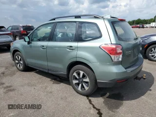 2018 Subaru Forester with VIN JF2SJABC1JH582343, listed as a Copart auction lot 61181195 with 82,904 mi miles and Salvage title. Bid and sale history available at DreamBid. Image 2.