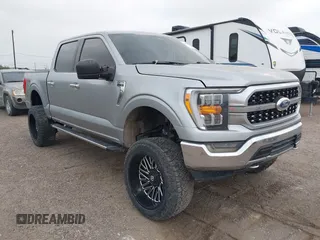 2021 Ford F-150 XL z VIN 1FTFW1E52MKD94436, wystawiony jako IAAI lot #42315850 z przebiegiem 72 900 mil mil oraz . Historia ofert i sprzedaży dostępna na DreamBid. Obrazek 1.