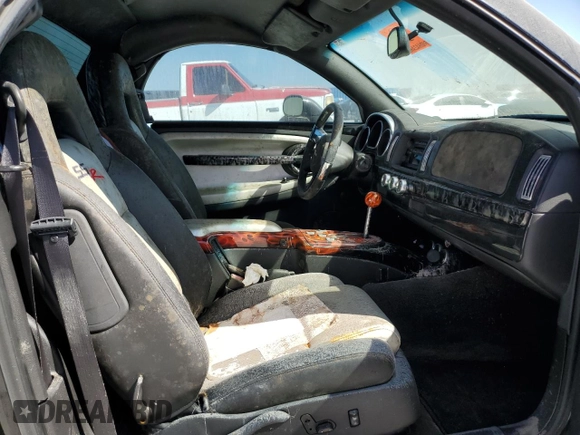 2005 Chevrolet SSR LS z VIN 1GCES14H45B115377, wystawiony jako Copart lot #48899155 z przebiegiem Nie podano mil oraz Szkoda całkowita • Salvage title. Historia ofert i sprzedaży dostępna na DreamBid. Obrazek 10.