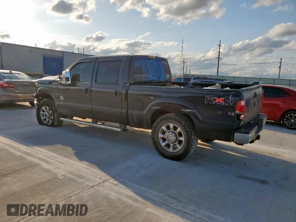 2011 Ford F-250 XL with VIN 1FT7W2BT0BEC60470, listed as a Copart auction lot 58010955 with 184,294 mi miles and Salvage title. Bid and sale history available at DreamBid. Image 2.