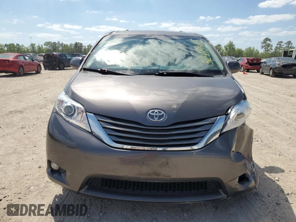 2012 Toyota Sienna XLE AAS with VIN 5TDYK3DCXCS199580, listed as a Copart auction lot 52455405 with 113,259 mi miles and Salvage Title. Bid and sale history available at DreamBid. Image 5.