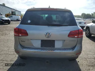 2012 Volkswagen Touareg с VIN WVGEG9BP6CD008533, выставлен на аукционе Copart как лот 60356345 с пробегом 103 270 миль миль и Чистый • Clean title. История ставок и продаж доступна на DreamBid. Изображение 6.