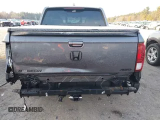 2020 Honda Ridgeline RTL-E with VIN 5FPYK3F70LB008292, listed as a IAAI auction lot 41357744 with 81,961 mi miles and . Bid and sale history available at DreamBid. Image 6.