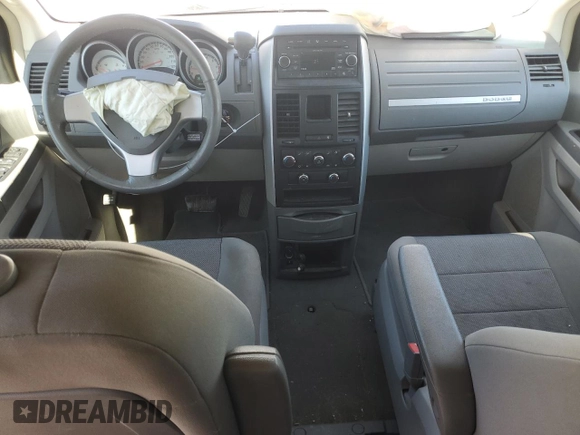 2009 Dodge Grand Caravan SXT z VIN 2D8HN54139R548082, wystawiony jako Copart lot #55882315 z przebiegiem 231 102 mil mil oraz Szkoda całkowita • Salvage title. Historia ofert i sprzedaży dostępna na DreamBid. Obrazek 8.