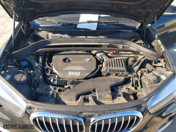 2018 BMW X1 sDrive28i with VIN WBXHU7C37J5H43318, listed as a IAAI auction lot 41294730 with 73,600 mi miles. Bid and sale history available at carsss.com. Image 10.