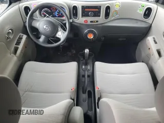 2009 Nissan Cube S z VIN JN8AZ28R39T105396, wystawiony jako Copart lot #57292795 z przebiegiem 94 536 mil mil oraz Tytuł czysty. Historia ofert i sprzedaży dostępna na DreamBid. Obrazek 8.
