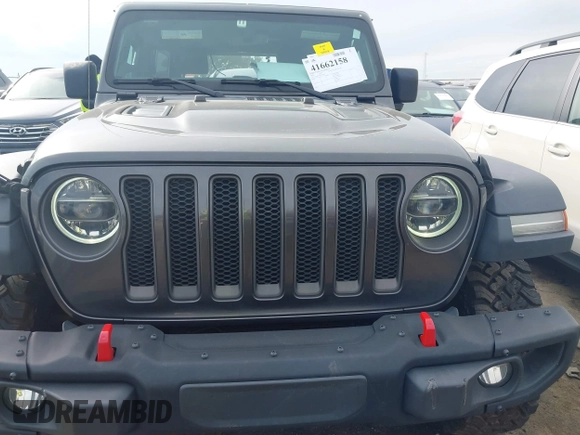 2020 Jeep Wrangler Unlimited Rubicon z VIN 1C4HJXFN8LW176002, wystawiony jako IAAI lot #41662158 z przebiegiem 55 924 mil mil oraz . Historia ofert i sprzedaży dostępna na DreamBid. Obrazek 12.