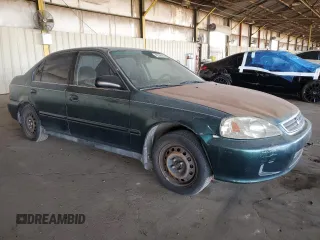 2000 Honda Civic VP z VIN 2HGEJ6612YH559659, wystawiony jako Copart lot #42545185 z przebiegiem 220 343 mil mil oraz Czysty tytuł • Clean title. Historia ofert i sprzedaży dostępna na DreamBid. Obrazek 4.