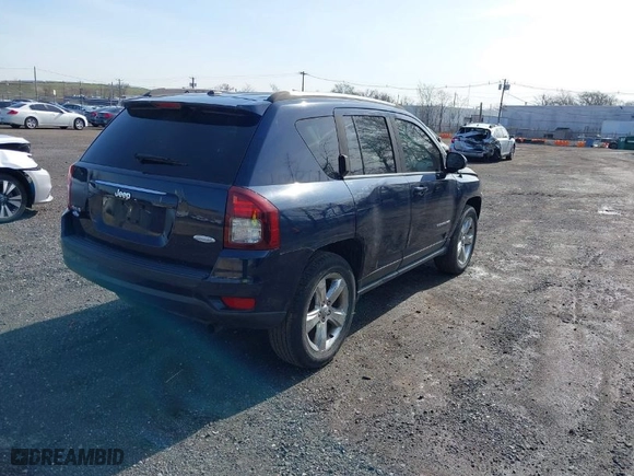 2014 Jeep Compass Latitude with VIN 1C4NJDEB1ED661864, listed as a IAAI auction lot 41950564 with 106,833 mi miles. Bid and sale history available at carsss.com. Image 4.