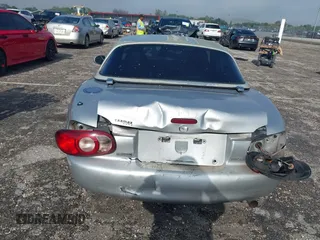 2003 Mazda MX-5 Miata Cloth with VIN JM1NB353730311899, listed as a IAAI auction lot 41929811 with 99,589 mi miles and . Bid and sale history available at DreamBid. Image 6.