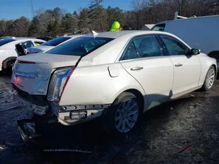 2014 Cadillac CTS Sedan RWD with VIN 1G6AP5SX3E0130274, listed as a IAAI auction lot 41293553 with 138,524 mi miles. Bid and sale history available at carsss.com. Image 4.