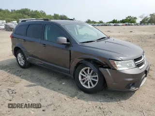 2017 Dodge Journey SXT z VIN 3C4PDCBG4HT531862, wystawiony jako Copart lot #59495495 z przebiegiem 187 780 mil mil oraz Szkoda całkowita • Salvage title. Historia ofert i sprzedaży dostępna na DreamBid. Obrazek 4.