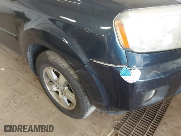 2009 Honda Pilot EX-L with VIN 5FNYF48509B036410, listed as a IAAI auction lot 41859708 with 216,558 mi miles. Bid and sale history available at carsss.com. Image 6.