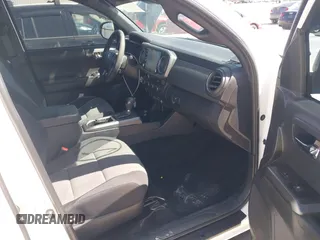 2023 Toyota Tacoma SR с VIN 3TMCZ5AN8PM647523, выставлен на аукционе IAAI как лот 41887896 с пробегом 17 864 миль миль и . История ставок и продаж доступна на DreamBid. Изображение 5.