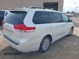 2012 Toyota Sienna XLE with VIN 5TDDK3DC3CS041984, listed as a IAAI auction lot 41711974 with 149,879 mi miles. Bid and sale history available at carsss.com. Image 4.
