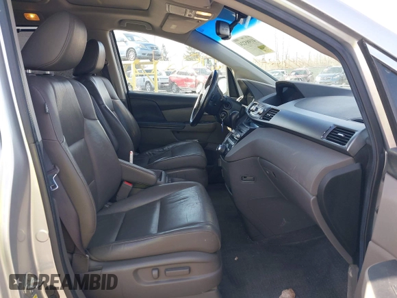 2011 Honda Odyssey Touring with VIN 5FNRL5H92BB049901, listed as a IAAI auction lot 41985224 with 101,957 mi miles and . Bid and sale history available at DreamBid. Image 5.