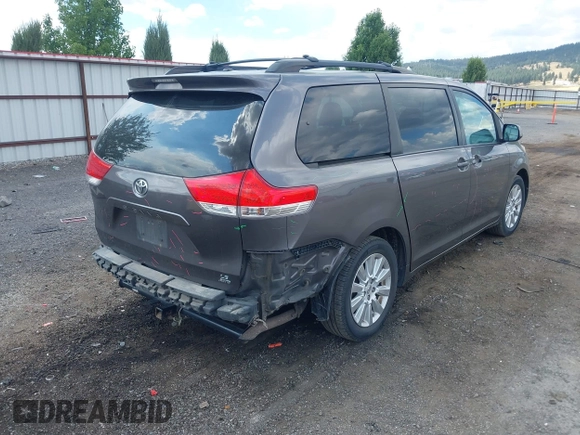 2012 Toyota Sienna LE with VIN 5TDJK3DC3CS037713, listed as a IAAI auction lot 42703815 with 208,000 mi miles and . Bid and sale history available at DreamBid. Image 4.