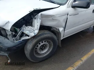 2002 Toyota Tacoma z VIN 5TENL42N02Z099046, wystawiony jako IAAI lot #41774946 z przebiegiem 189 134 mil mil oraz . Historia ofert i sprzedaży dostępna na DreamBid. Obrazek 14.