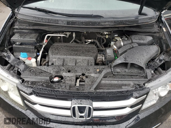 2015 Honda Odyssey EX-L z VIN 5FNRL5H64FB048406, wystawiony jako Copart lot #58044065 z przebiegiem 61 005 mil mil oraz Szkoda całkowita • Salvage title. Historia ofert i sprzedaży dostępna na DreamBid. Obrazek 12.
